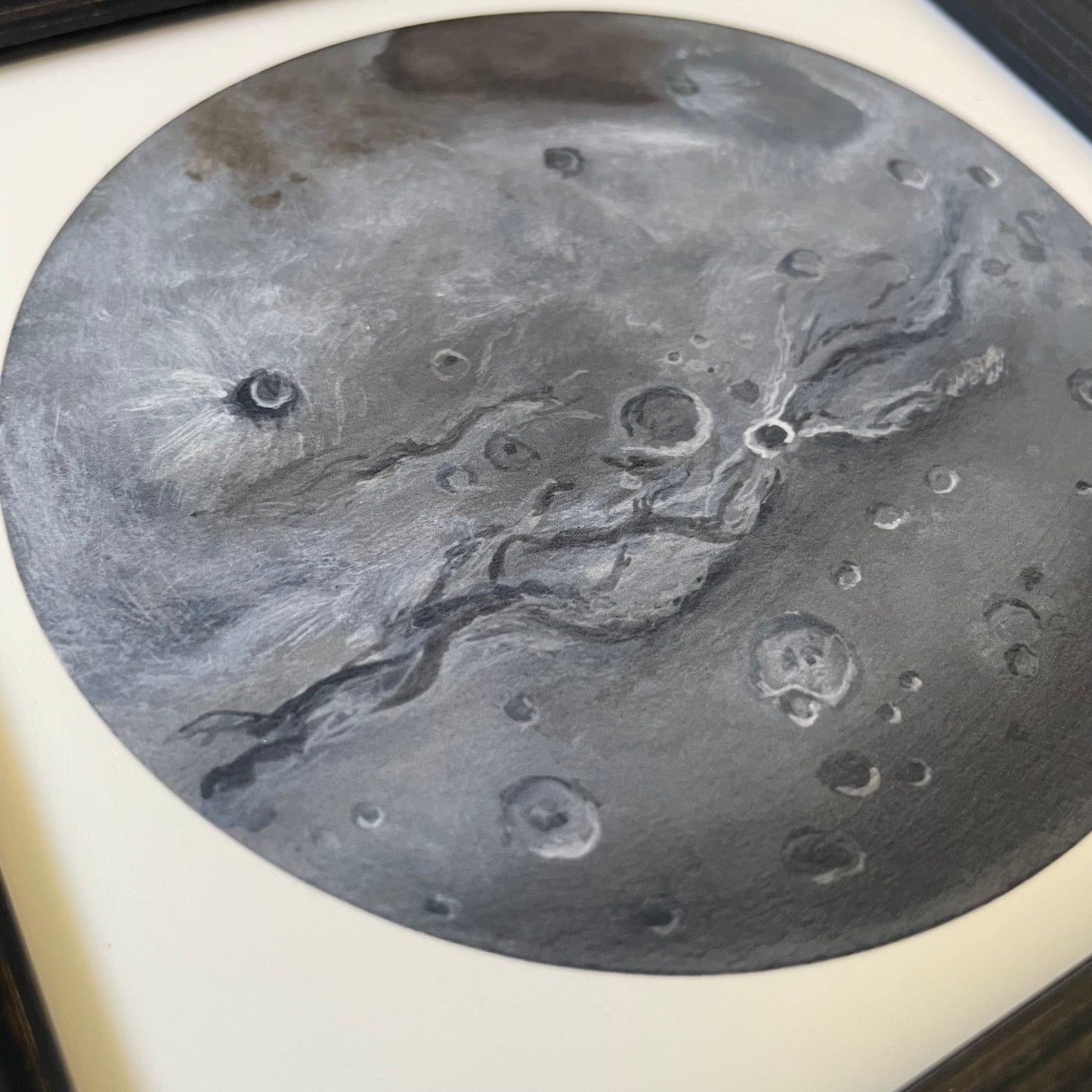 Close up of Charon print at an angle