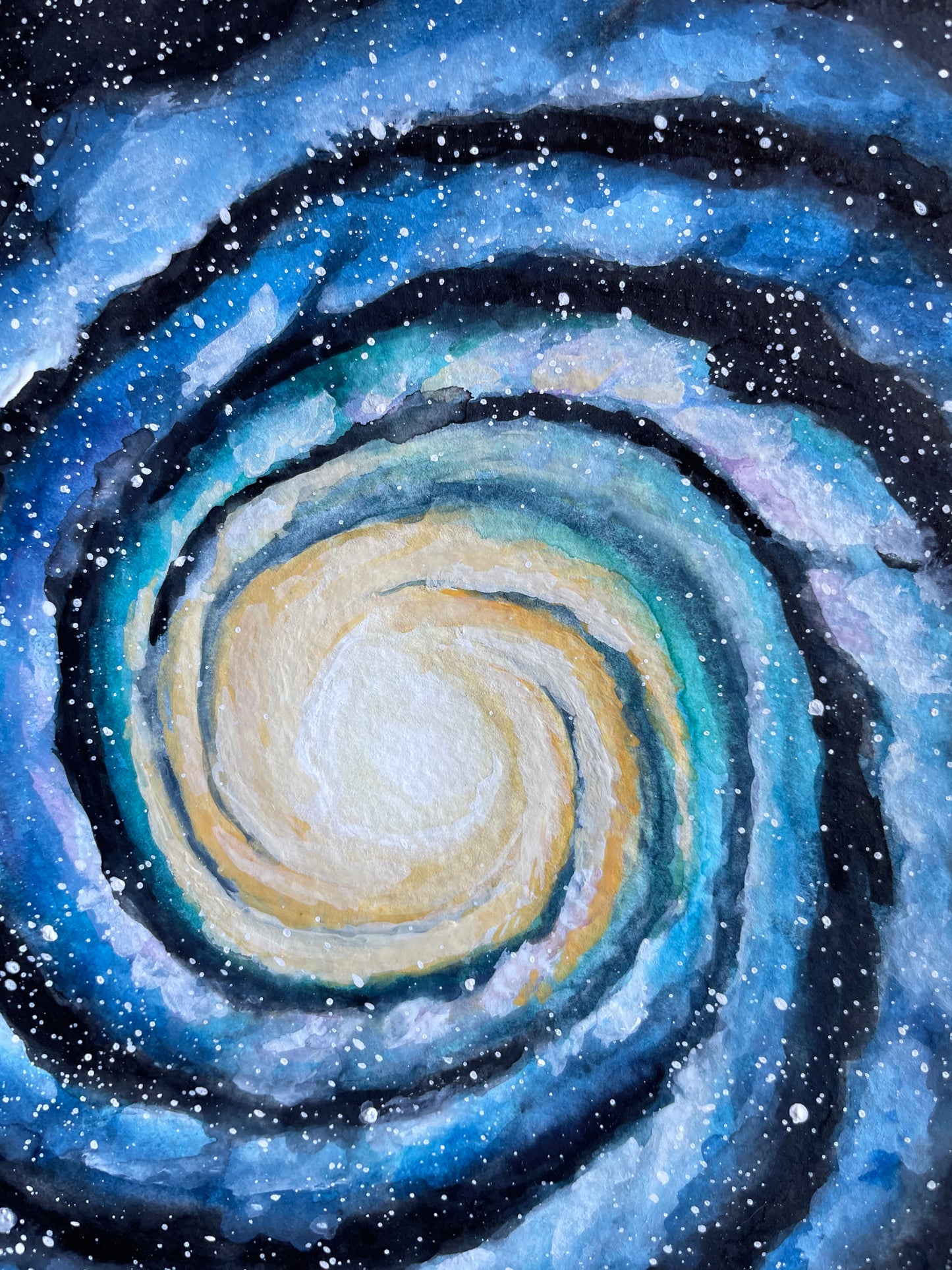 Watercolor spiral galaxy with blue and green arms, fading into yellow at the center