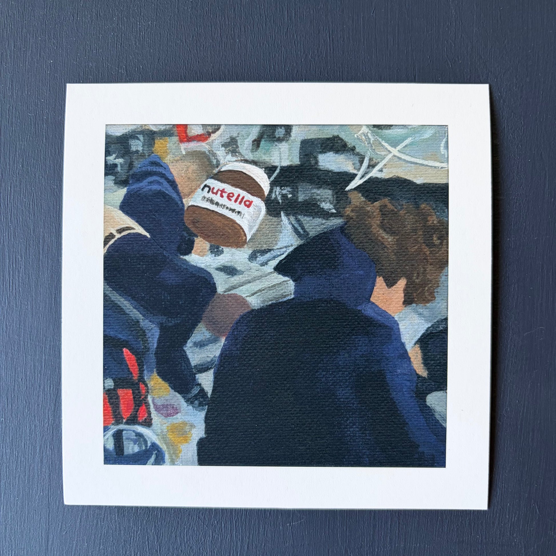 mini print of Nutella jar in foreground and Artemis astronauts in the background
