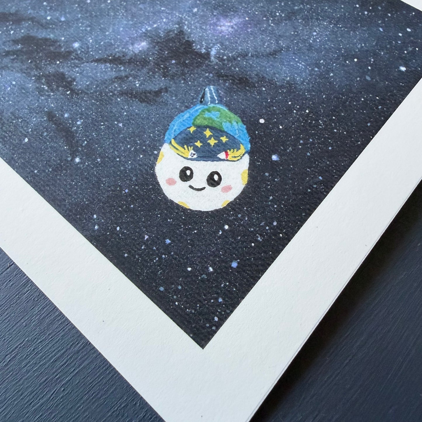 Close up of Rise in the bottom corner of the mini prints