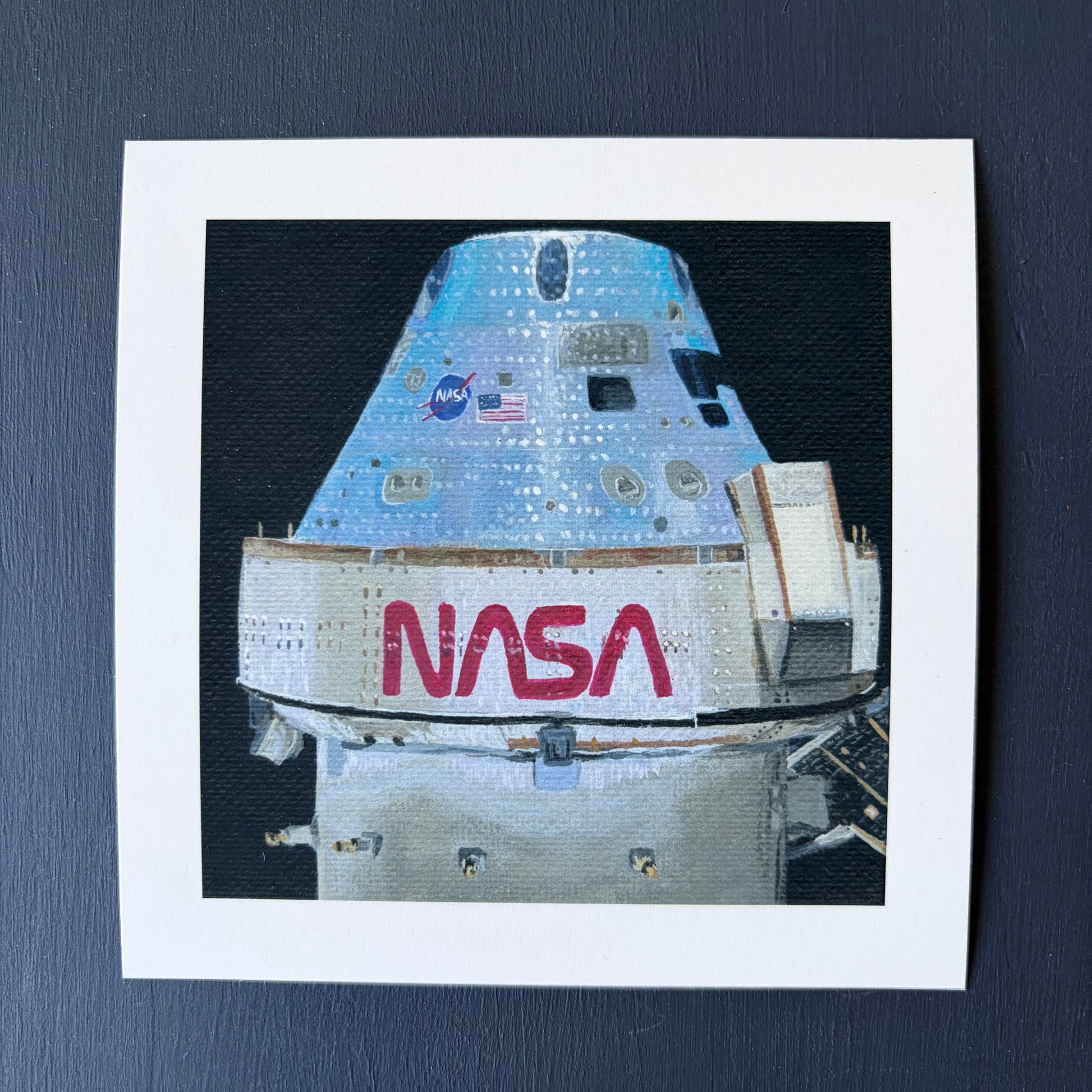 mini print of Orion capsule  on a black background