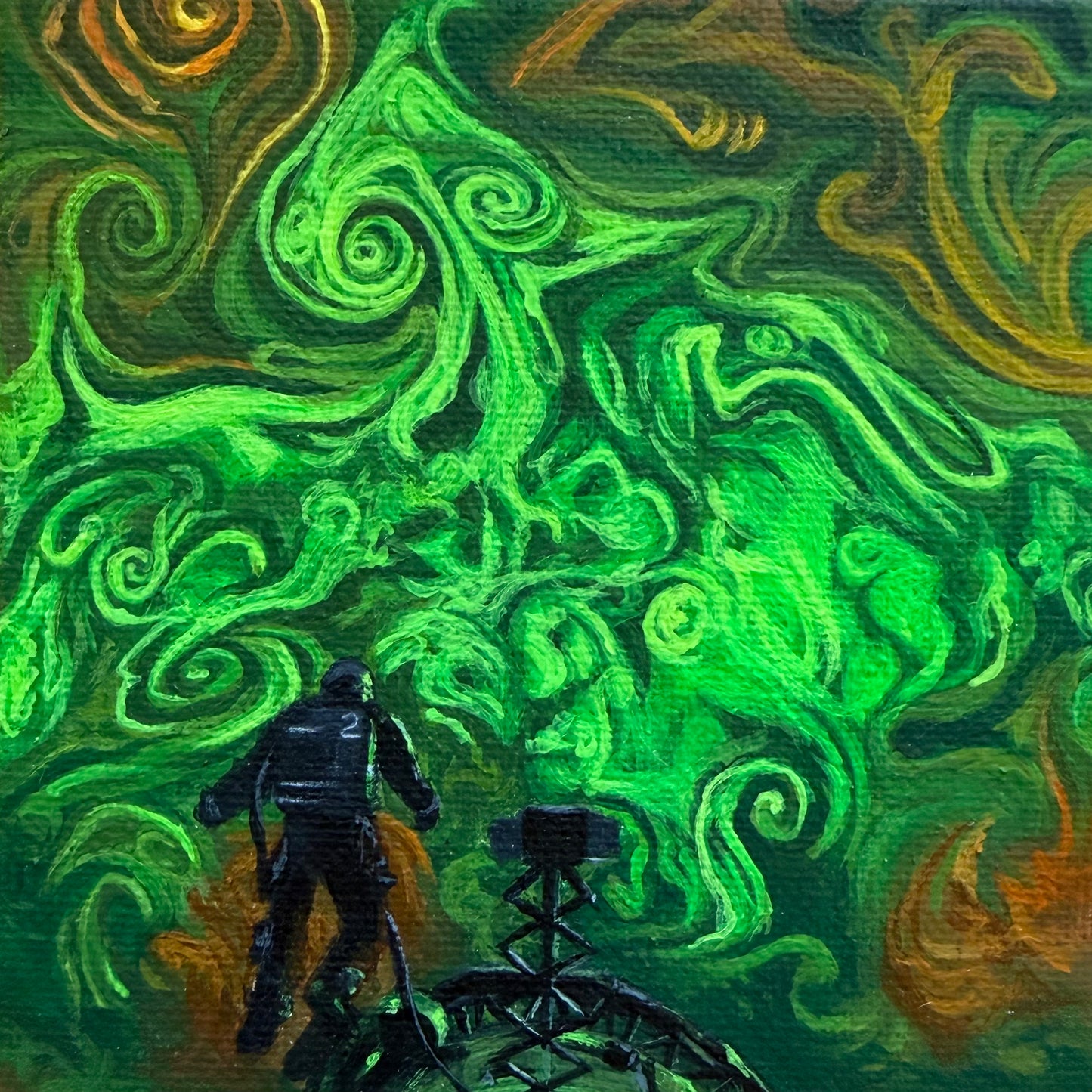 Close up of mini painting with swirling green and orange clouds. An astronaut floats above a spaceship at the bottom of the piece.