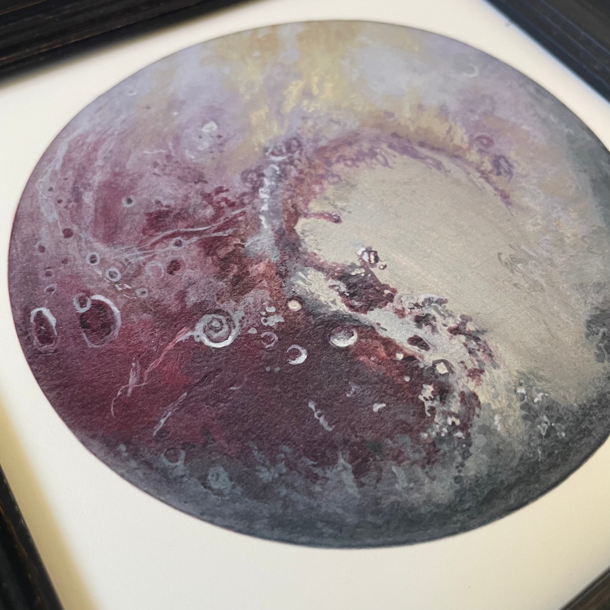 Close up of Pluto print at an angle